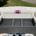 Slide: The Image of 1993 American Skier Legend boat interior with white and purple upholstery. - 4