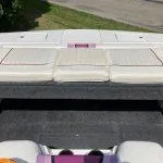 Slide: The Image of 1993 American Skier Legend boat interior with white cushioned seating. - 7