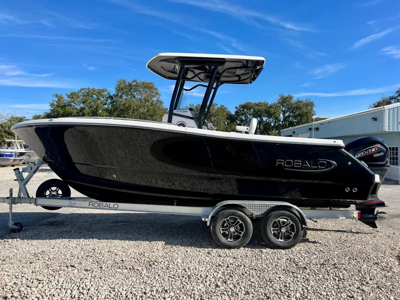 Slide: The Image of 2024 Robalo R230 boat on trailer with Yamaha engine. - 4
