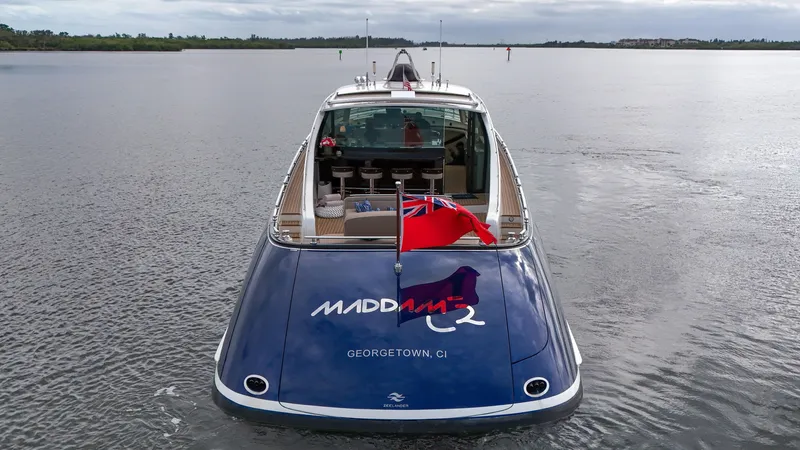 Slide: The Image of Zeelander 72 yacht 2023 on calm waters, rear view with flag and name Maddame 2. - 10