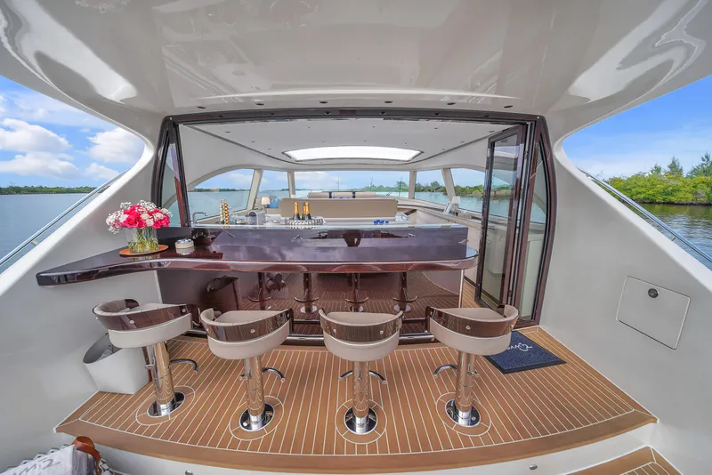 Slide: The Image of Luxurious 2023 Zeelander 72 yacht with elegant bar and seating area. - 44