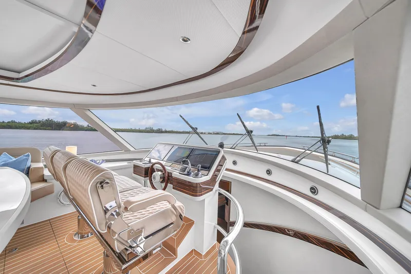Slide: The Image of Luxurious helm station of the 2023 Zeelander 72 yacht with panoramic views. - 48
