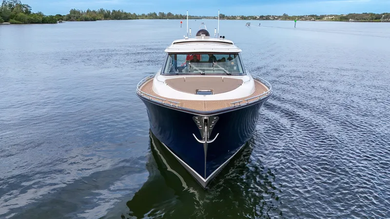 Slide: The Image of 2023 Zeelander 72 luxury yacht cruising on a calm waterway. - 5