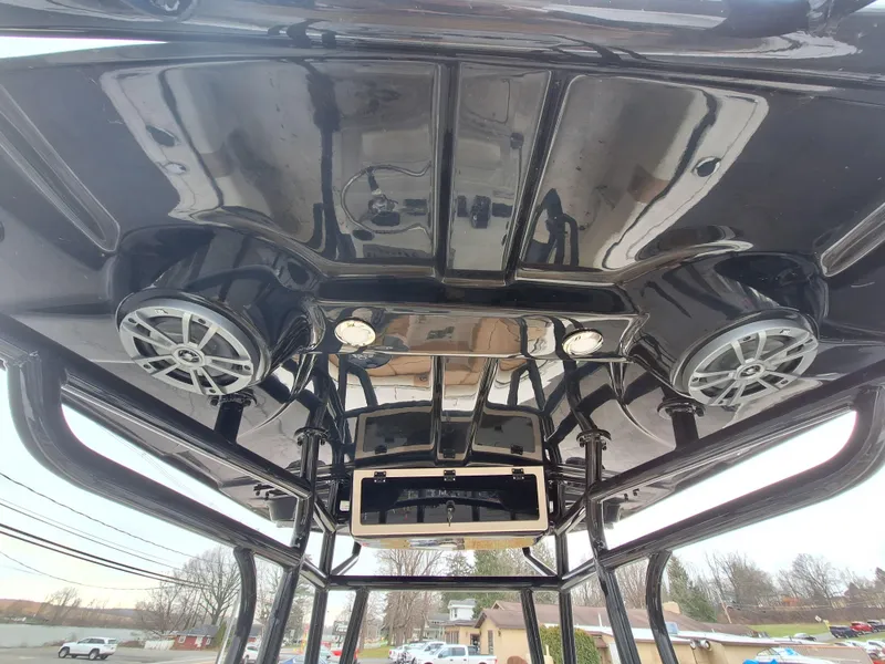 Slide: The Image of 2023 Carolina Skiff 21 Ultra Elite T-top with speakers and lights. - 7