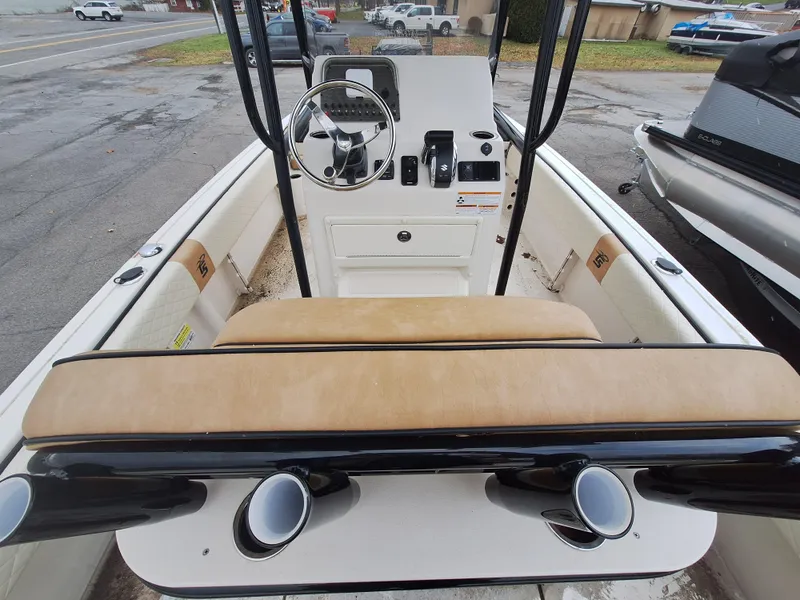 Slide: The Image of 2023 Carolina Skiff 21 Ultra Elite boat interior with steering console and seating. - 8