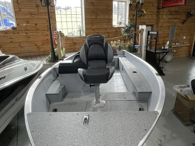 Slide: The Image of 2024 Lund Fury 1600 SS fishing boat in showroom. - 9
