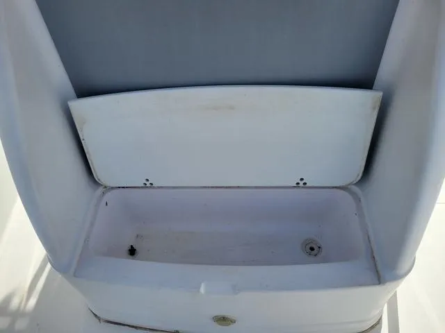 Slide: The Image of 1998 Donzi 35 ZF boat storage compartment, open and empty. - 16