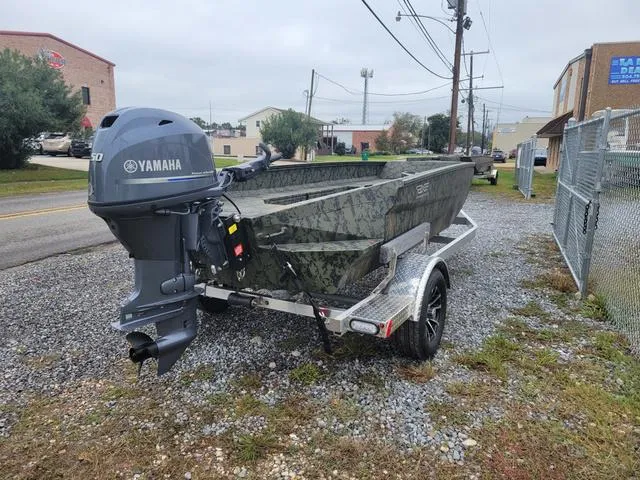 Slide: The Image of 2024 Edge Duck Boats 653DB with Yamaha outboard motor on trailer. - 3