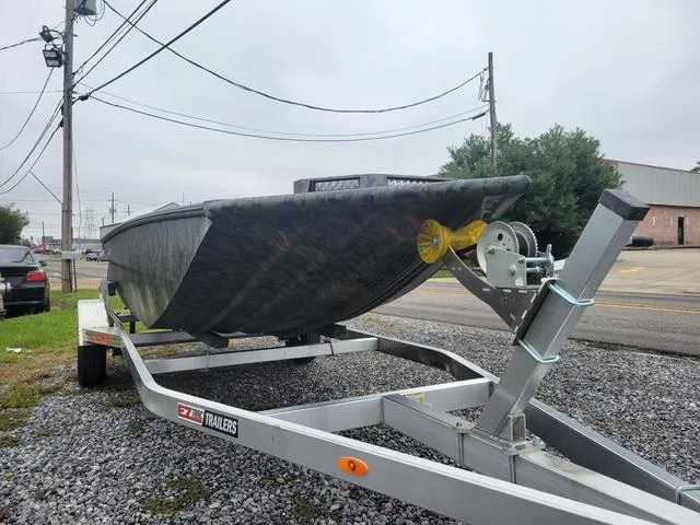 Slide: The Image of 2024 Edge Duck Boats 653DB on a trailer, parked outdoors. - 4