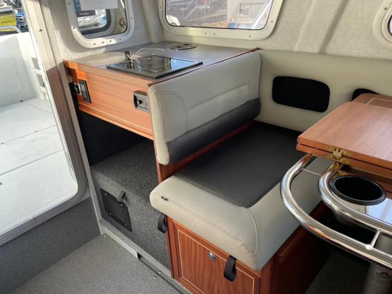 Slide: The Image of Interior of 2024 KingFisher 2725 Weekender boat with seating and kitchenette. - 16
