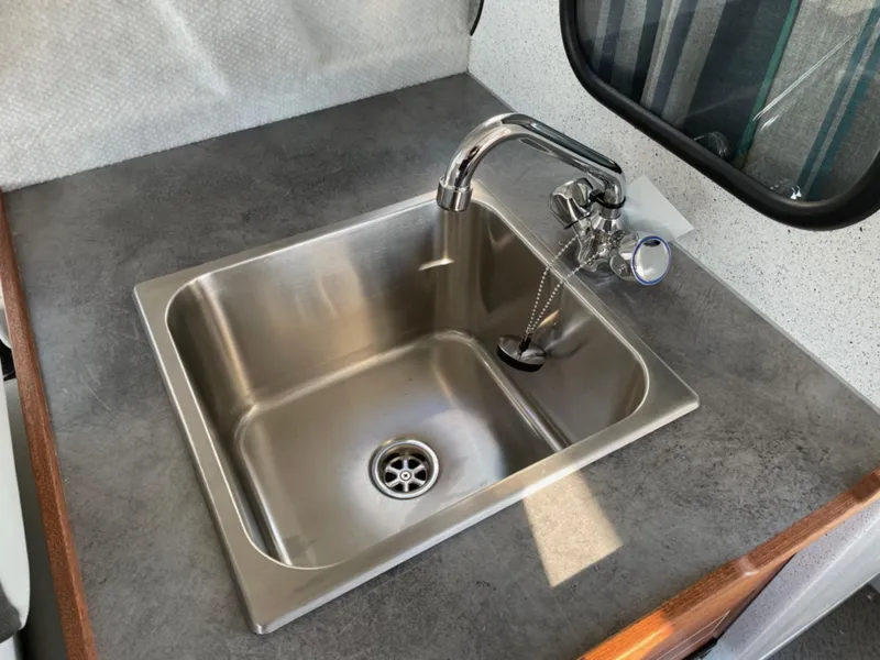 Slide: The Image of Stainless steel sink in 2024 KingFisher 2725 Weekender boat kitchen. - 19
