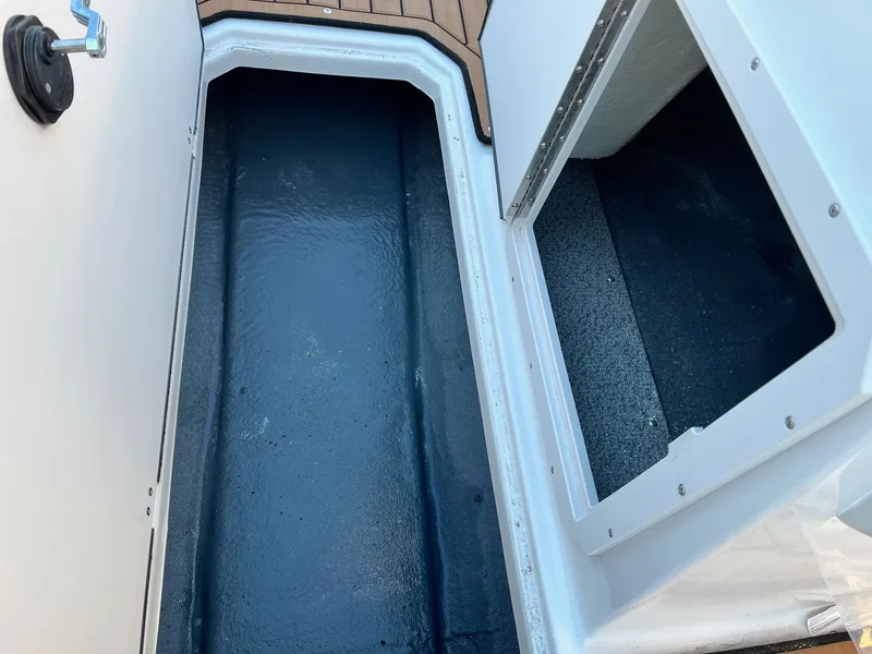 Slide: The Image of 2024 Starcraft SVX 191 boat storage compartments. - 14