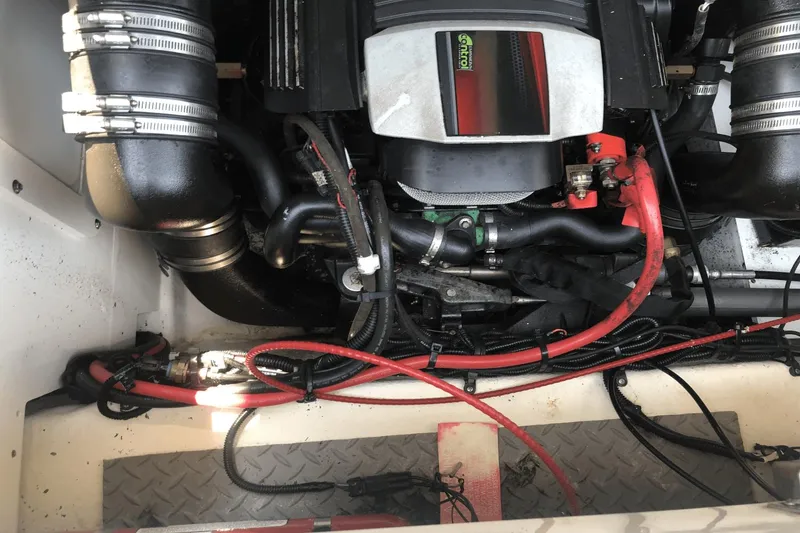 Slide: The Image of Engine compartment of a 2017 Sea Ray SDX 270 boat, showing detailed components and wiring. - 35