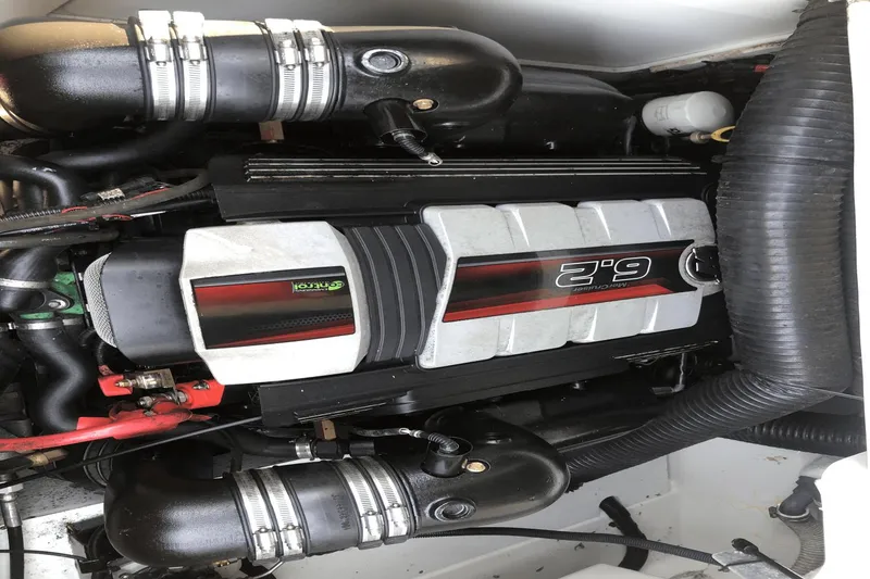 Slide: The Image of Engine of a 2017 Sea Ray SDX 270 boat, featuring a 6.2L MerCruiser. - 36