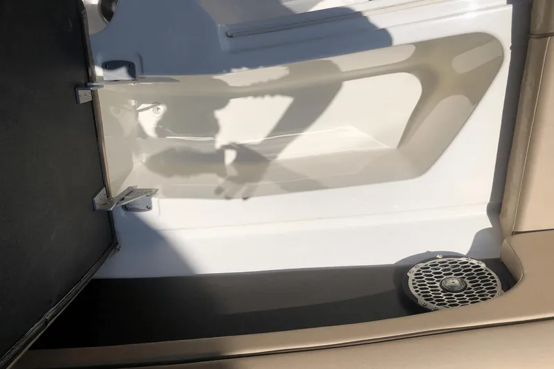 Slide: The Image of Interior view of a 2017 Sea Ray SDX 270 boat with speaker and seating. - 40