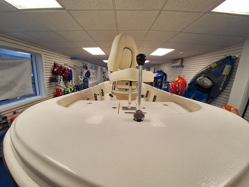 Slide: The Image of 2023 Carolina Skiff 178 JLS boat interior in showroom. - 10