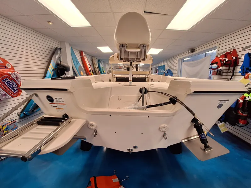 Slide: The Image of 2023 Carolina Skiff 178 JLS boat on display in showroom. - 11