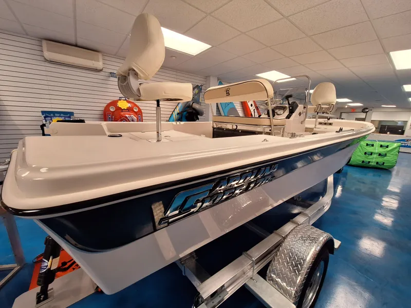 Slide: The Image of 2023 Carolina Skiff 178 JLS boat on display in showroom. - 2