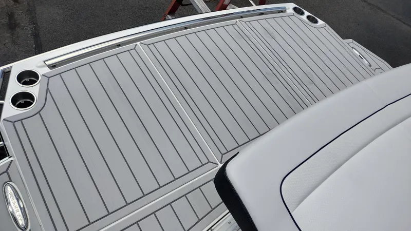 Slide: The Image of 2026 Formula 330 CBR boat deck with sleek, modern design and integrated cup holders. - 20