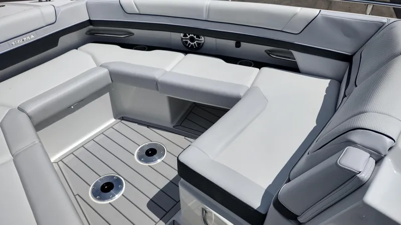 Slide: The Image of 2026 Formula 330 CBR boat interior with sleek gray seating and modern design. - 28