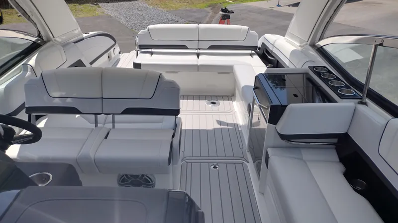 Slide: The Image of 2026 Formula 330 CBR boat interior with luxurious white seating and sleek design. - 30