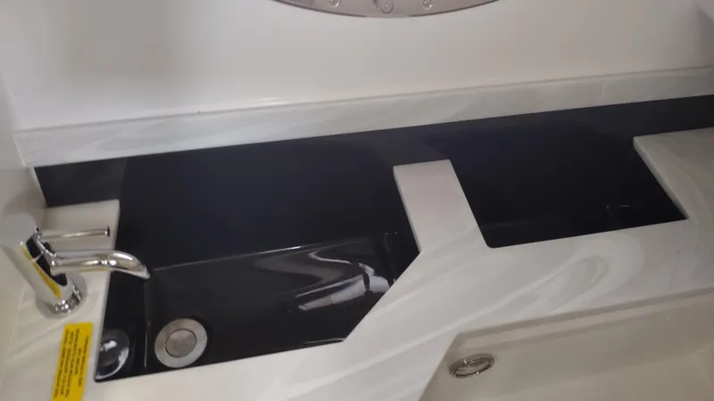 Slide: The Image of Modern sink and faucet in 2026 Formula 330 CBR boat interior. - 35