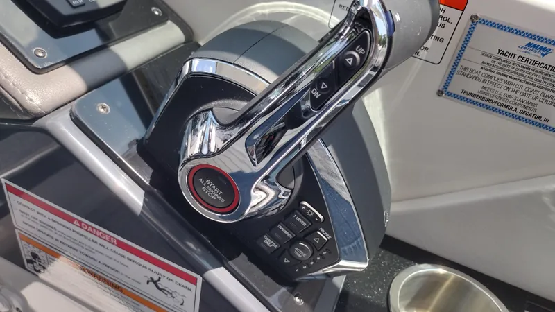 Slide: The Image of Control panel of 2026 Formula 330 CBR boat with start/stop button and warning labels. - 46