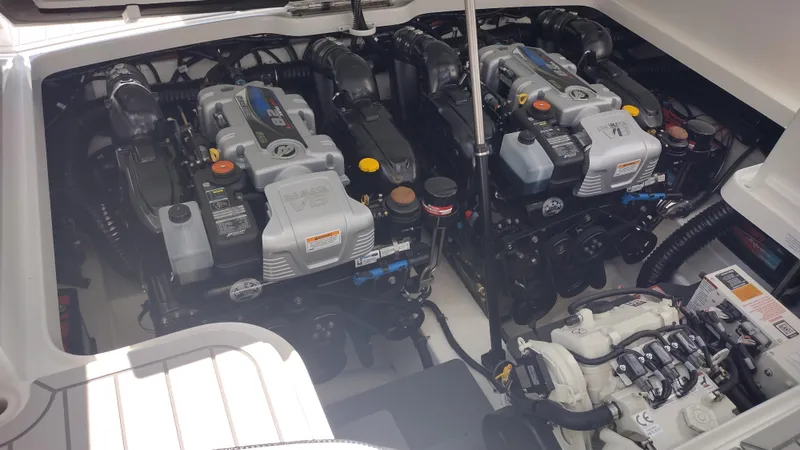 Slide: The Image of Engine compartment of 2026 Formula 330 CBR boat, showcasing dual engines and components. - 48