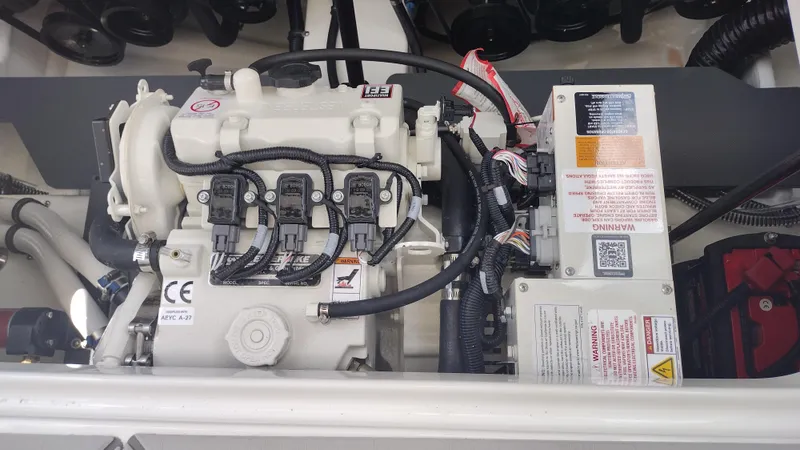 Slide: The Image of Engine compartment of a 2026 Formula 330 CBR boat, showcasing detailed wiring and components. - 50