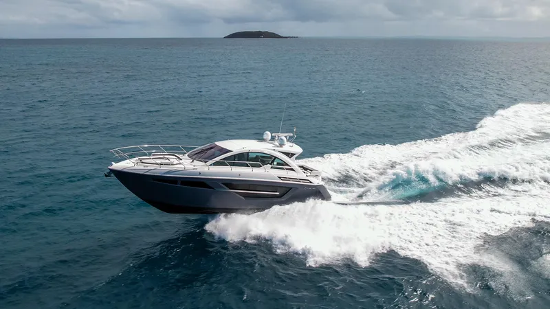 Slide: The Image of 2019 Cruisers Yachts 50 Cantius cruising on open water. - 11