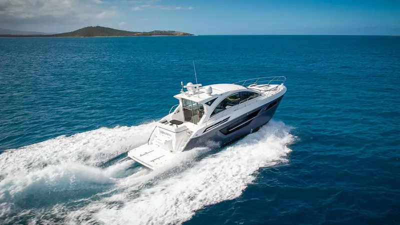 Slide: The Image of 2019 Cruisers Yachts 50 Cantius cruising on open blue water. - 14