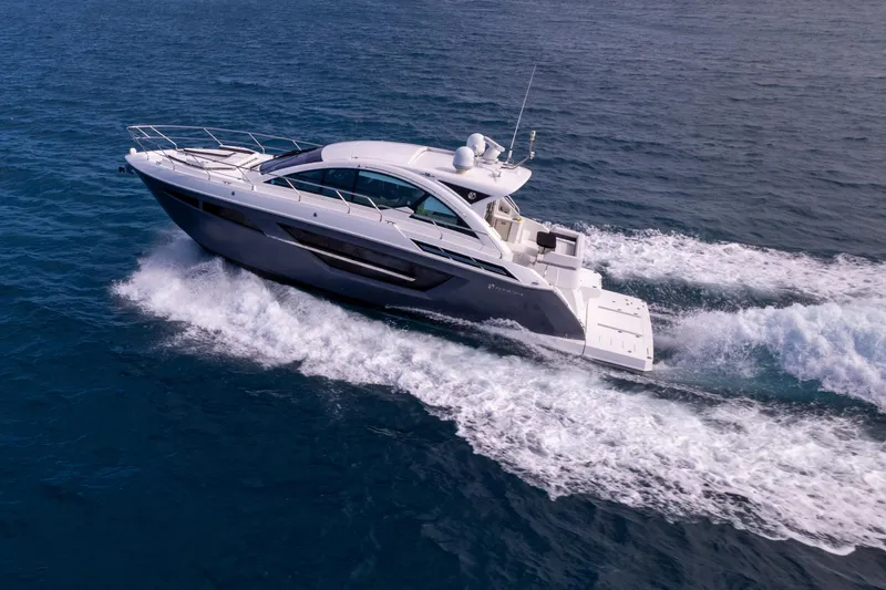 Slide: The Image of 2019 Cruisers Yachts 50 Cantius cruising on open water. - 16