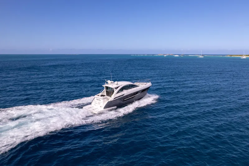 Slide: The Image of 2019 Cruisers Yachts 50 Cantius cruising on open blue ocean. - 19