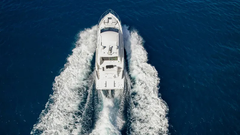 Slide: The Image of Aerial view of 2019 Cruisers Yachts 50 Cantius cruising on open water. - 20