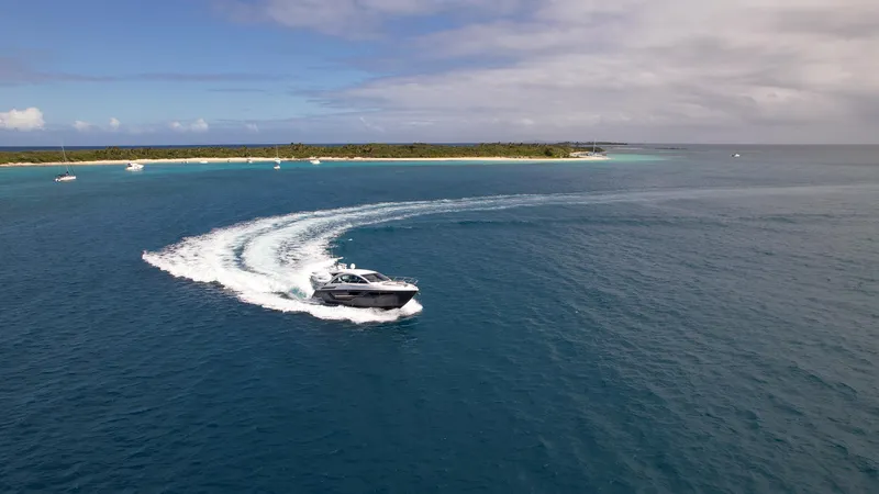 Slide: The Image of 2019 Cruisers Yachts 50 Cantius cruising near a tropical island. - 21