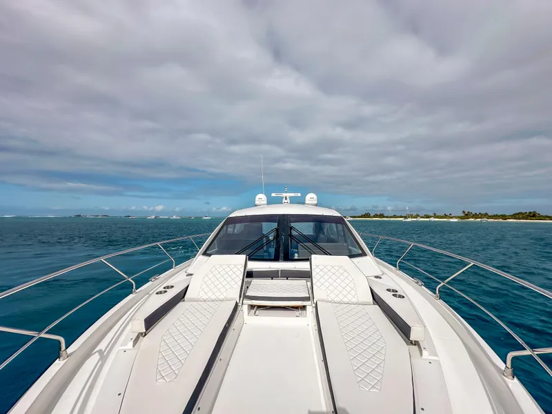 Slide: The Image of 2019 Cruisers Yachts 50 Cantius on open water with island in background. - 22