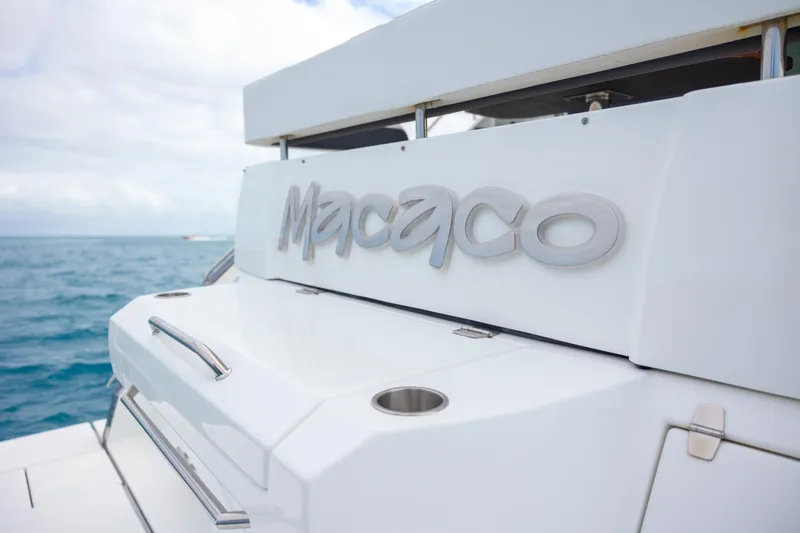 Slide: The Image of 2019 Cruisers Yachts 50 Cantius, rear view with Macaco nameplate. - 24