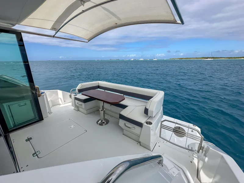 Slide: The Image of 2019 Cruisers Yachts 50 Cantius aft deck with ocean view. - 27