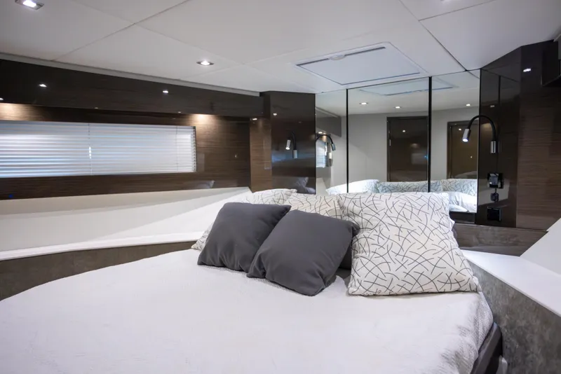 Slide: The Image of Luxurious bedroom interior of 2019 Cruisers Yachts 50 Cantius with modern design and cozy bedding. - 38