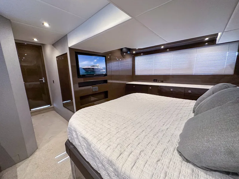 Slide: The Image of Luxurious bedroom interior of 2019 Cruisers Yachts 50 Cantius with TV and modern decor. - 42