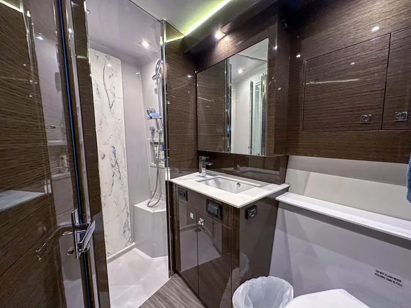 Slide: The Image of Luxurious bathroom in 2019 Cruisers Yachts 50 Cantius with modern fixtures and shower. - 44