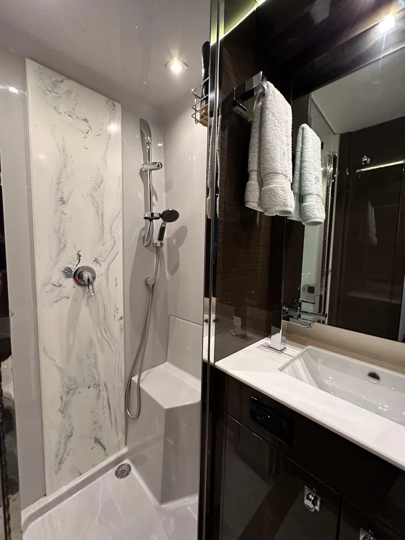Slide: The Image of Luxurious bathroom in 2019 Cruisers Yachts 50 Cantius with modern shower and sink. - 48