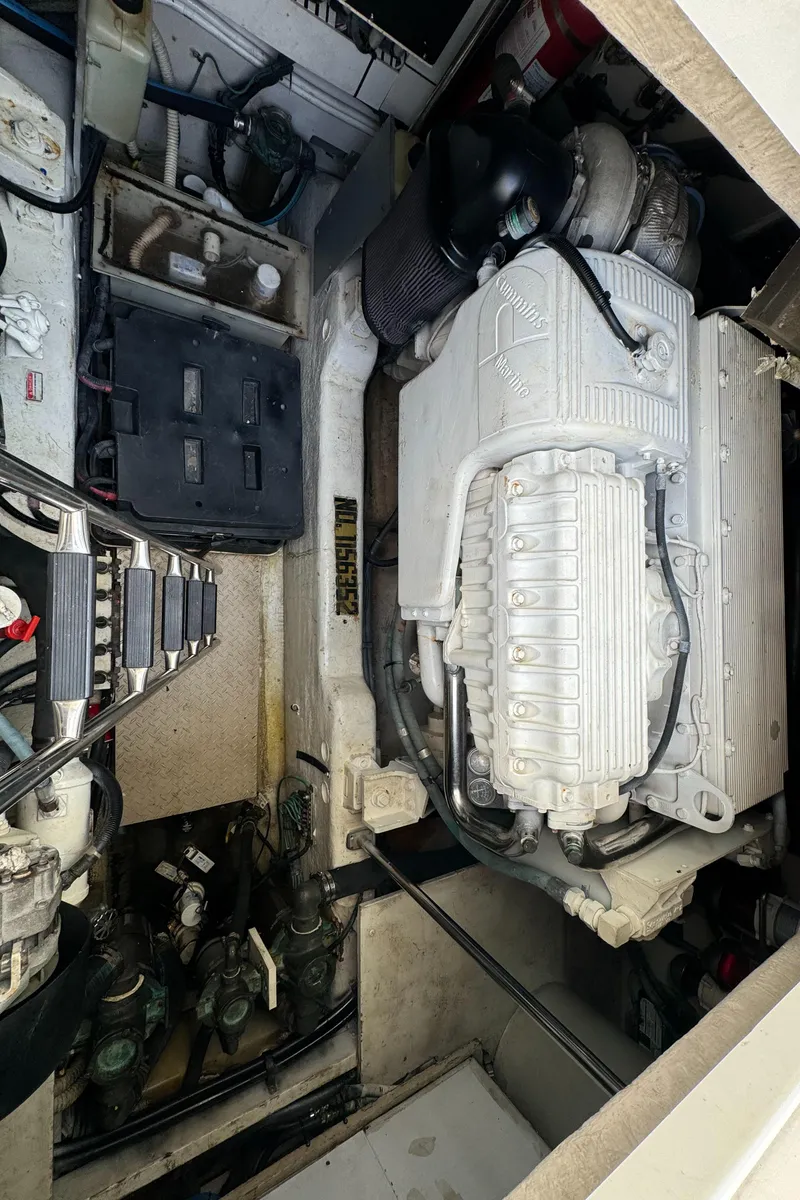 Slide: The Image of Engine compartment of a 2004 Sea Ray 500 Sundancer yacht. - 16
