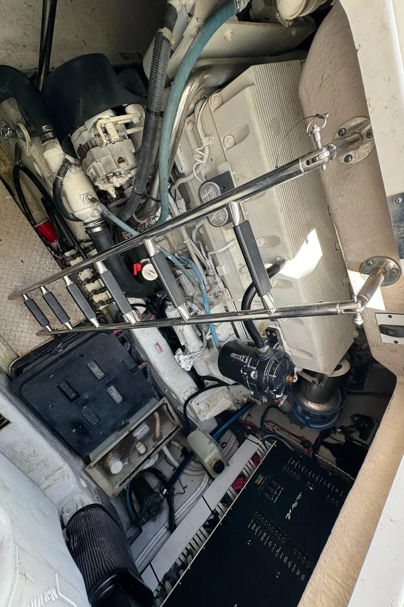 Slide: The Image of Engine compartment of a 2004 Sea Ray 500 Sundancer boat. - 17