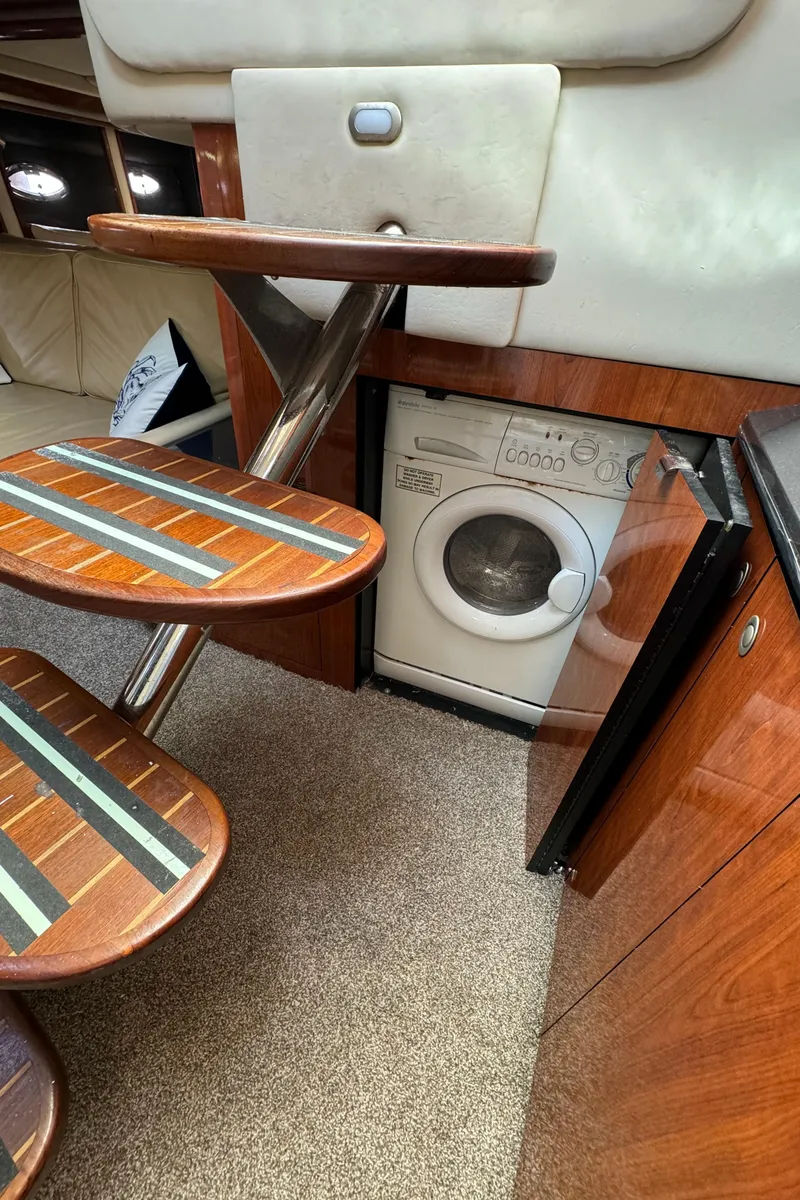 Slide: The Image of Interior of 2004 Sea Ray 500 Sundancer with built-in washing machine. - 6