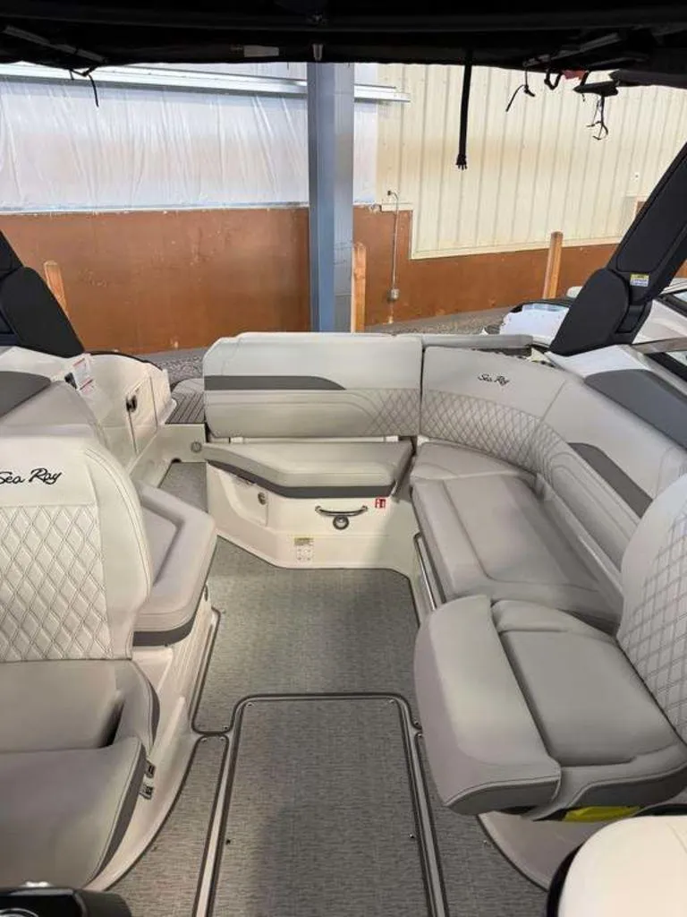 Slide: The Image of 2024 Sea Ray SLX 260 Surf boat interior with luxurious seating and modern design. - 3