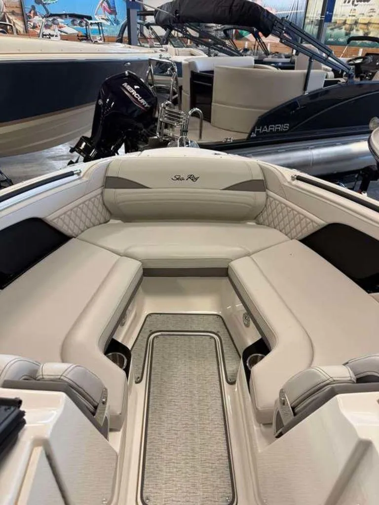 Slide: The Image of 2024 Sea Ray SLX 260 Surf boat interior with luxurious seating and modern design. - 7