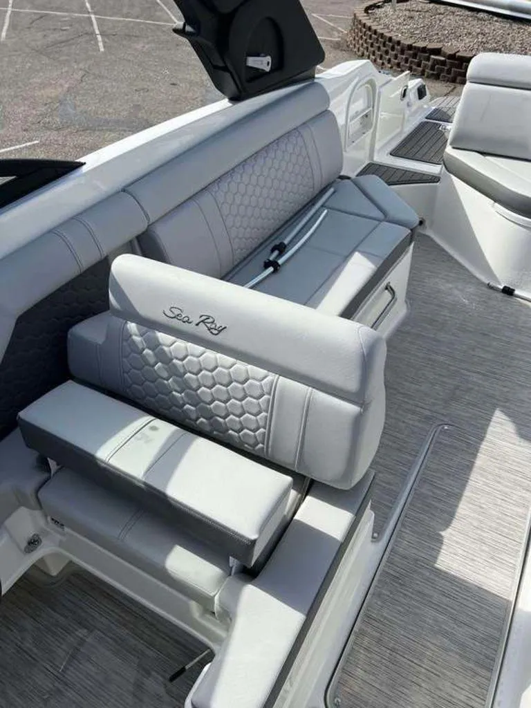 Slide: The Image of 2024 Sea Ray SDX 270 boat interior with luxurious seating and modern design. - 3