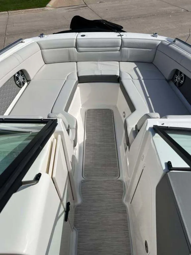 Slide: The Image of 2024 Sea Ray SDX 270 boat interior with spacious seating and modern design. - 6