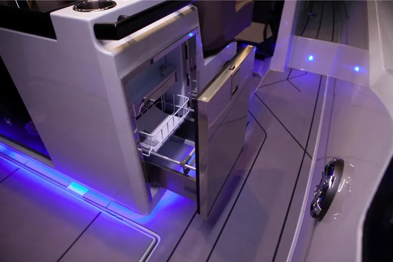 Slide: The Image of Saxdor 320 GTO 2024 interior with open drawer and blue LED lighting. - 13